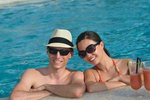 happy young couple relax and take fresh drink photo