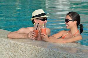 happy young couple relax and take fresh drink photo