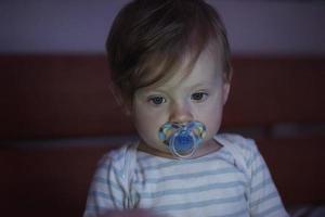 cute  little  baby playing and making first steps photo