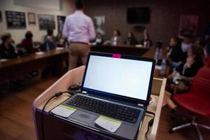 laptop computer at podium photo