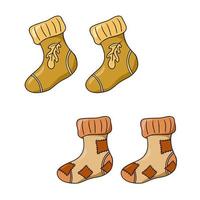 un conjunto de iconos de colores, viejos calcetines de punto cálidos con un patrón, calcetines con fugas, parches, ilustración vectorial en estilo de dibujos animados sobre un fondo blanco vector