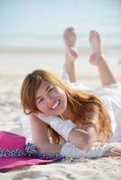 asian bride on beach photo