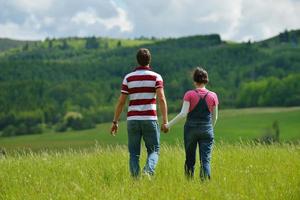 romantic young couple in love together outdoor photo