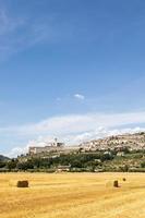 Assisi village in Umbria region, Italy. The town is famous for the most important Italian Basilica dedicated to St. Francis - San Francesco. photo