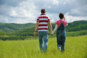 romantic young couple in love together outdoor photo