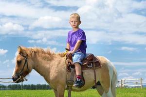 child ride pony photo