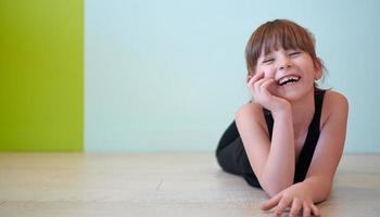 girl having fun and dancing wearing mothers jewelry photo