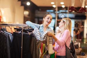 happy young girls in  shopping mall photo