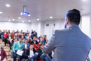 businessman giving presentations at conference room photo