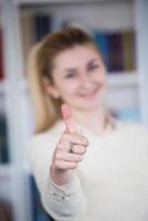 portrait of female student in library photo