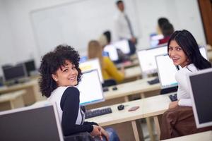 students group in computer lab classroom photo