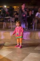 little girl dancing in the kids disco photo