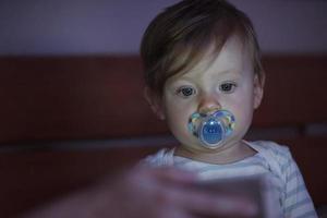 cute  little  baby playing and making first steps photo