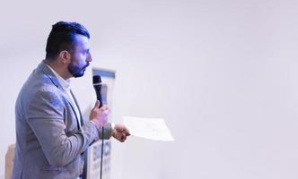 businessman giving presentations at conference room photo