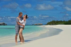 happy young couple have fun on summer photo