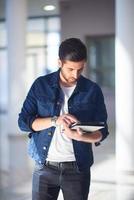 student using tablet computer photo