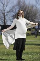 happy young pregnant woman outdoor photo