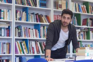 student study  in school library photo