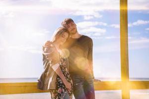 Couple chating and having fun at beach bar photo