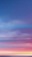Sunset in evening with Orange,Yellow,Pink and Blue sky,Vertical Dramatic landscape Sunrise,Vector Dusk Sky,Romantic Twilight banner of Sunlight reflection by the sea for web, mobile screen background vector