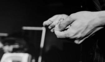 Male hands with a needle photo