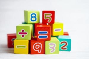 Number wood block cubes for learning Mathematic, education math concept. photo