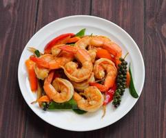 shrimp puff peppers with herbs. photo