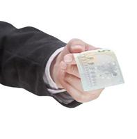 five euro banknote in male hand photo