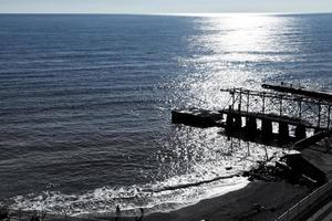 beach and pier in Gaspra in morning, Crimea photo