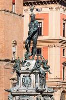 Sculpture on fouintain in Bologna in sunny day photo