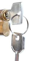 bunch of home keys in cylinder lock photo