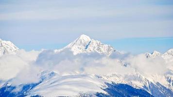 snow-covered mountain peak in Dolomites, Italy photo