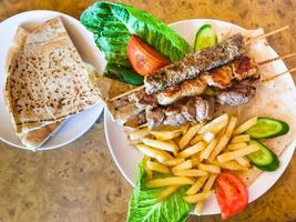 top view of portion of various arabian kebabs photo