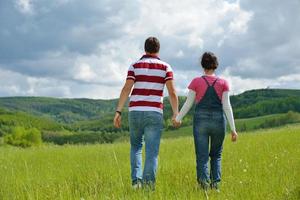 romantic young couple in love together outdoor photo