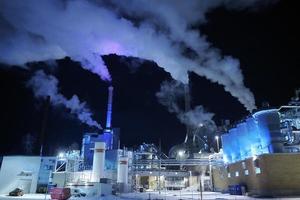 Norway, 2022 - Factory at Night Air Pollution From Industrial Smoke photo