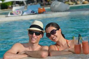 happy young couple relax and take fresh drink photo