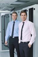 it engineers in network server room photo