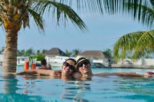 happy young couple relax and take fresh drink photo