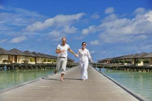 happy young  couple at summer vacation have fun and relax at beach photo