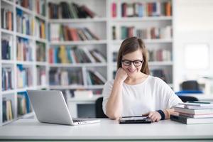female student study in school library photo