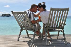 happy young couple relax and take fresh drink photo