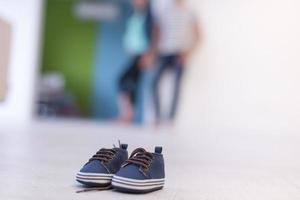 pair of blue baby shoes photo