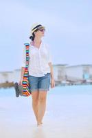 beautiful gril on beach have fun photo