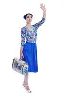 pinup retro  woman with travel bag isolated photo