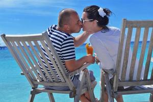 happy young couple relax and take fresh drink photo