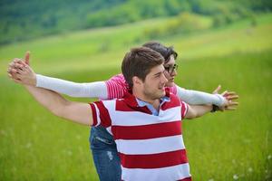 romantic young couple in love together outdoor photo