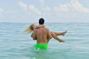 happy young  couple at summer vacation have fun and relax photo