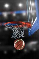 pelota y red de baloncesto foto