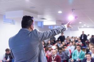 businessman giving presentations at conference room photo