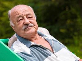 portrait of senior man with mustache photo